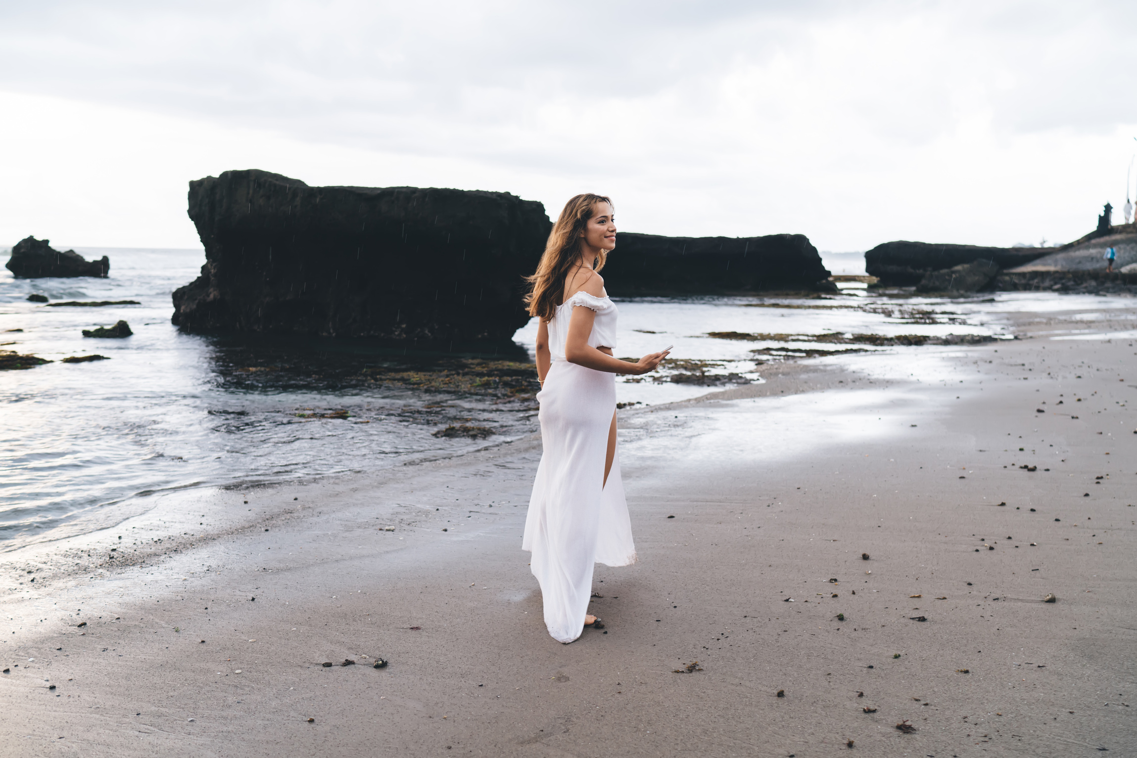 Happy Woman Surfing Smartphone during Stroll